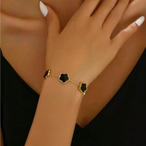 Elegant Gold and Black Floral Bracelet